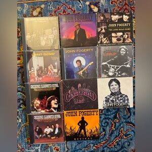 John Fogerty and Creedence Clearwater Revival group of music CDs